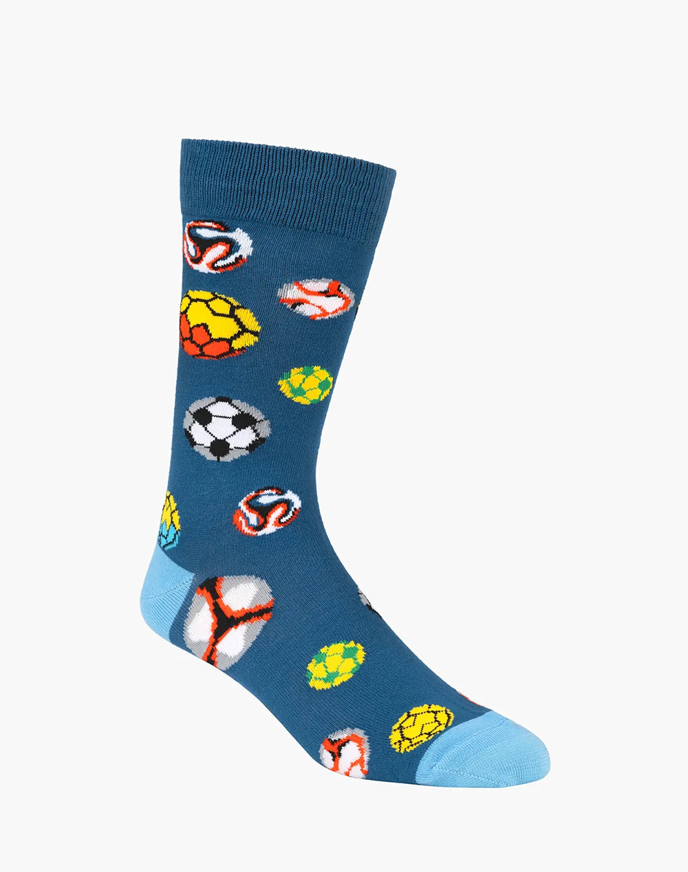 A single crew sock in dark blue with a pattern of soccer balls and balls with stripes, featuring a light blue toe and heel, shown on a plain light gray background.