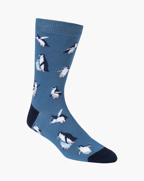Blue sock with penguin pattern on a white background
