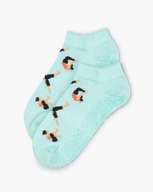 Mint green yoga socks.