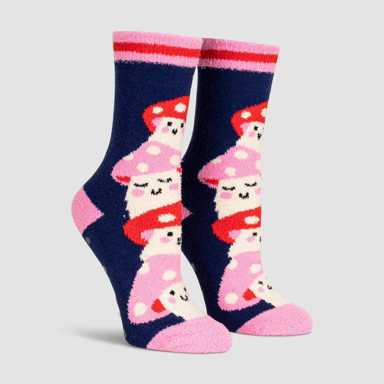 Pair of socks with mushroom design on a light gray background