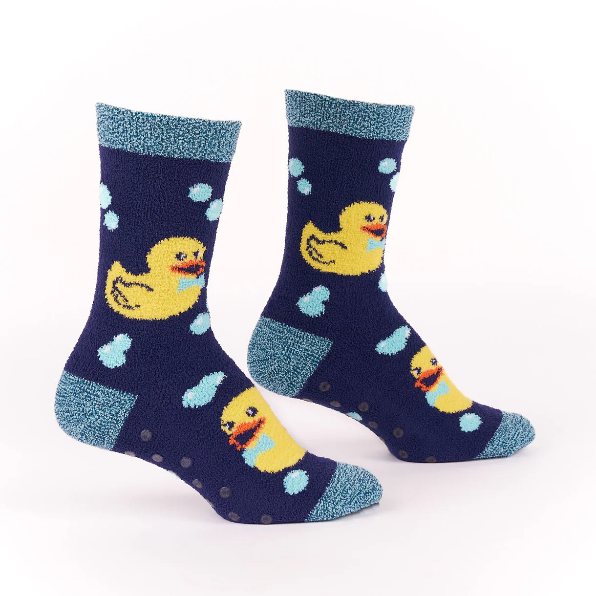 Navy blue socks with yellow duck designs on a white background