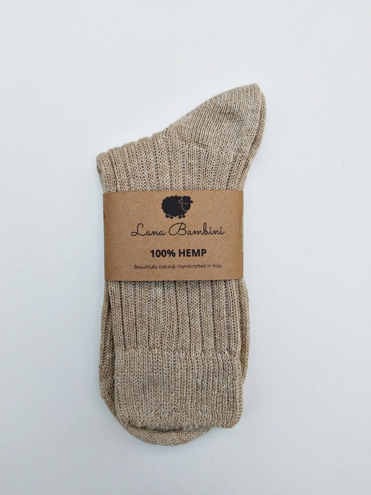 Beige hemp sock with a brown label on a light gray background