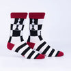 Pair of socks with chess-themed design on a white background