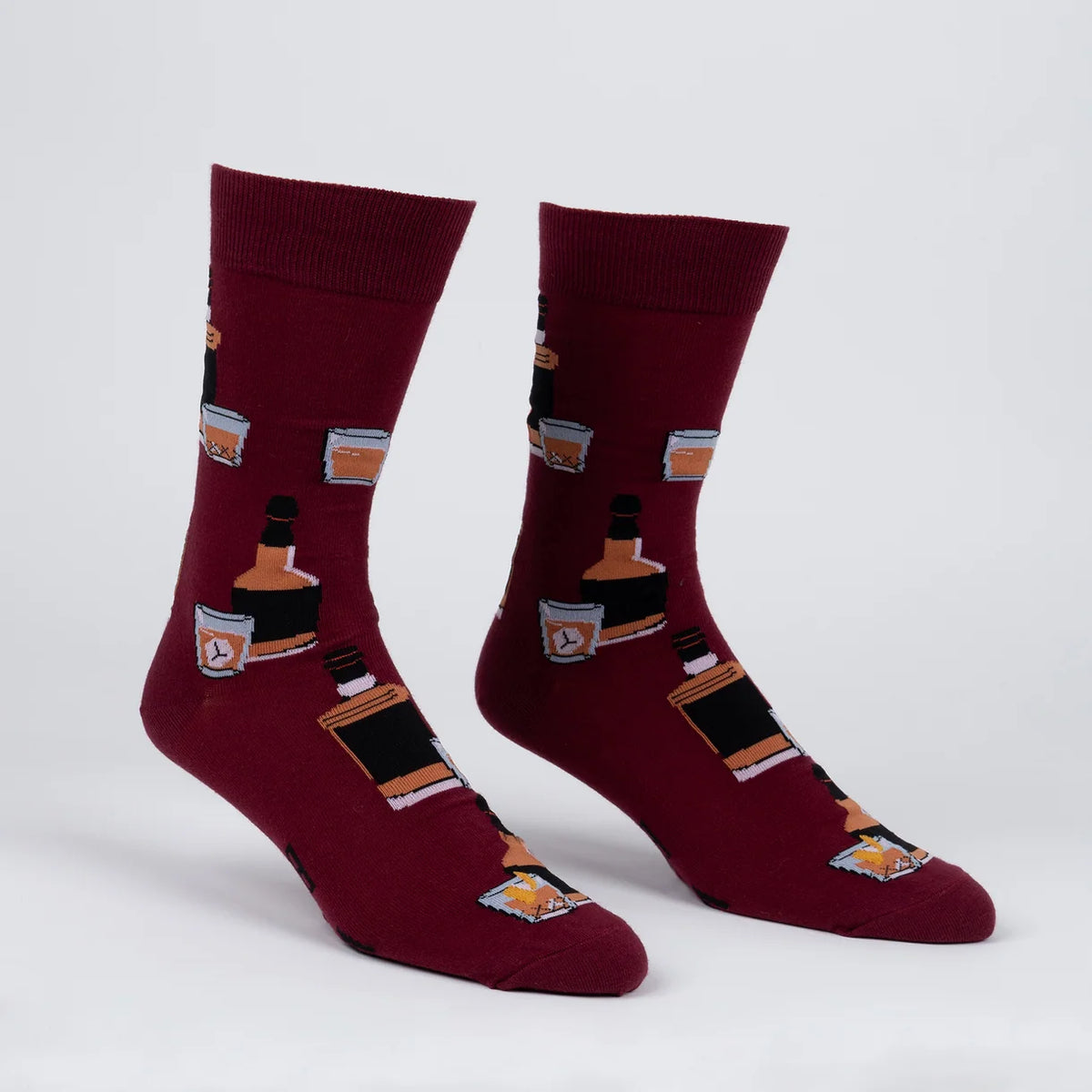 burgundy socks with whiskey bottles and glasses