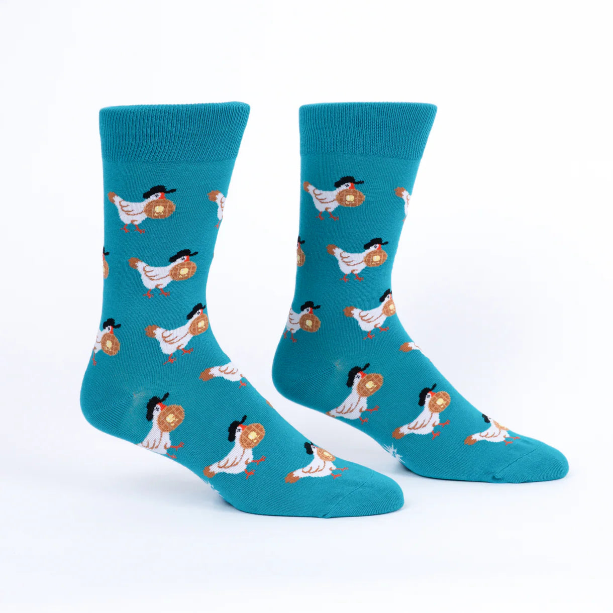 Pair of blue socks with chicken pattern on a white background
