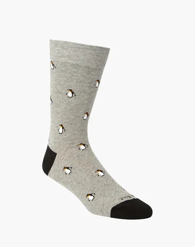 Gray sock with penguin pattern on a white background