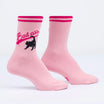 Pink socks with "bad ass" writing and a black cat's bum
