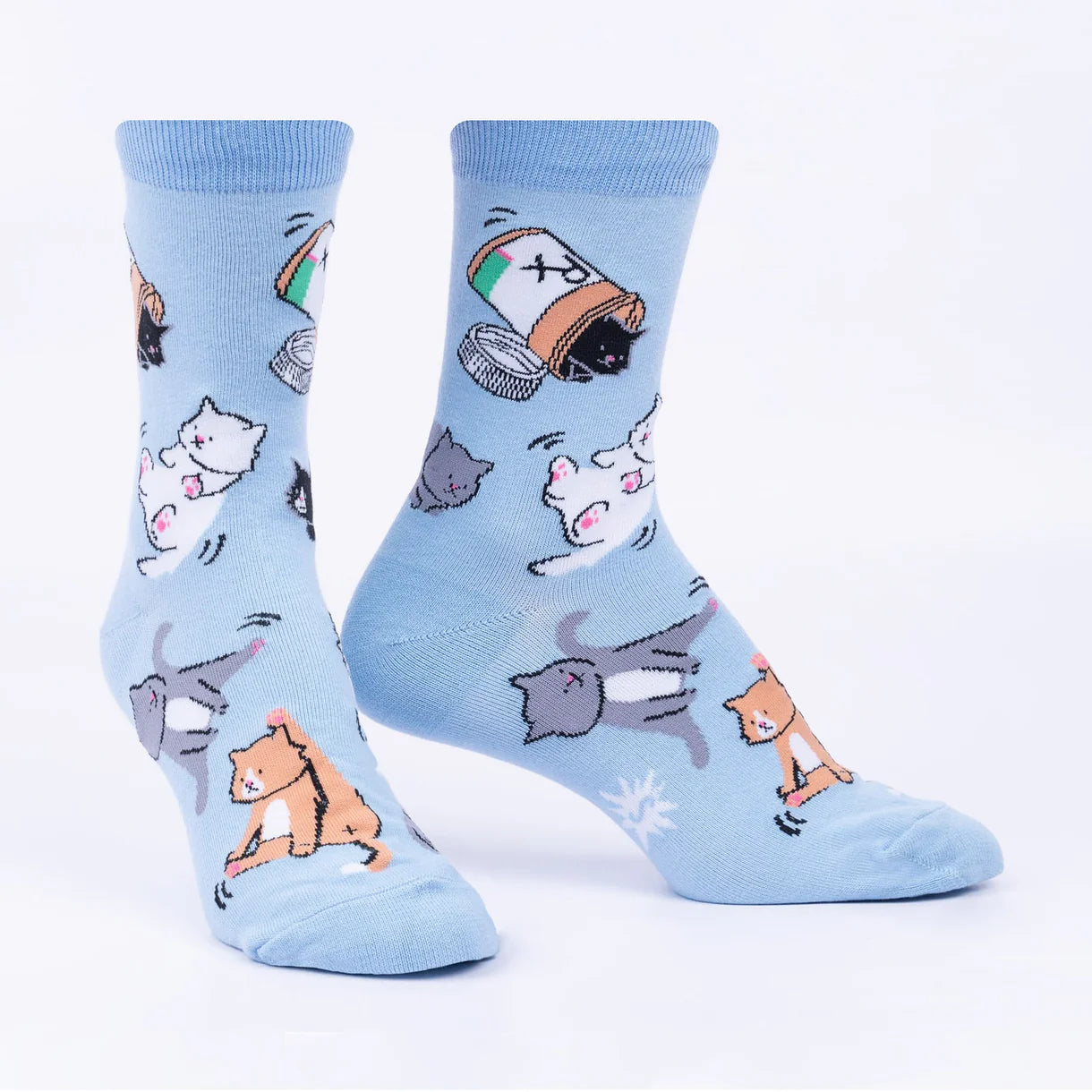 Light blue socks with cartoon cat designs on a white background
