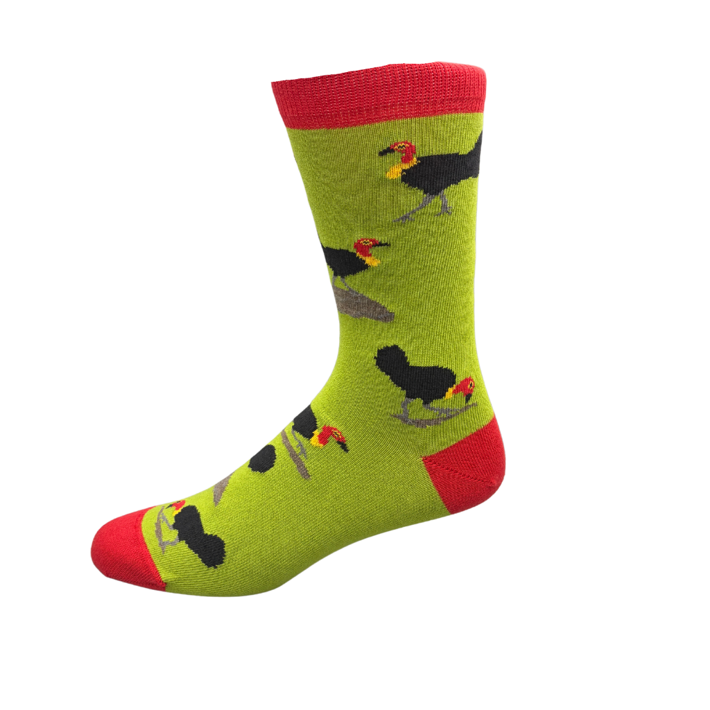 Green sock with a brush turkey with red accents.