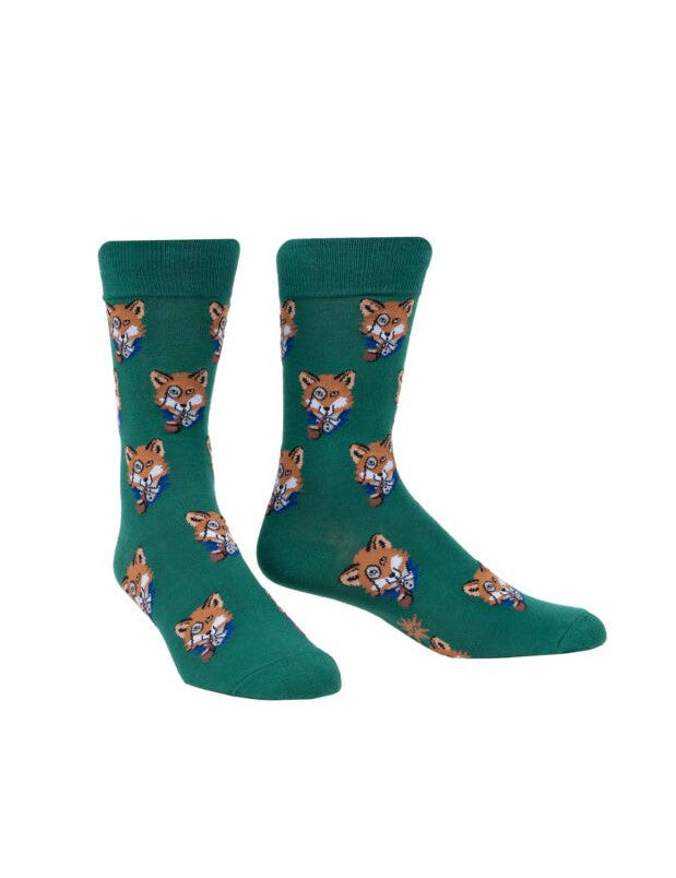 Green socks with fox pattern on a white background