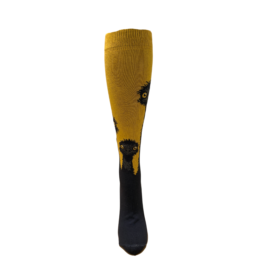 Mustard yellow and black sock with a design on a white background