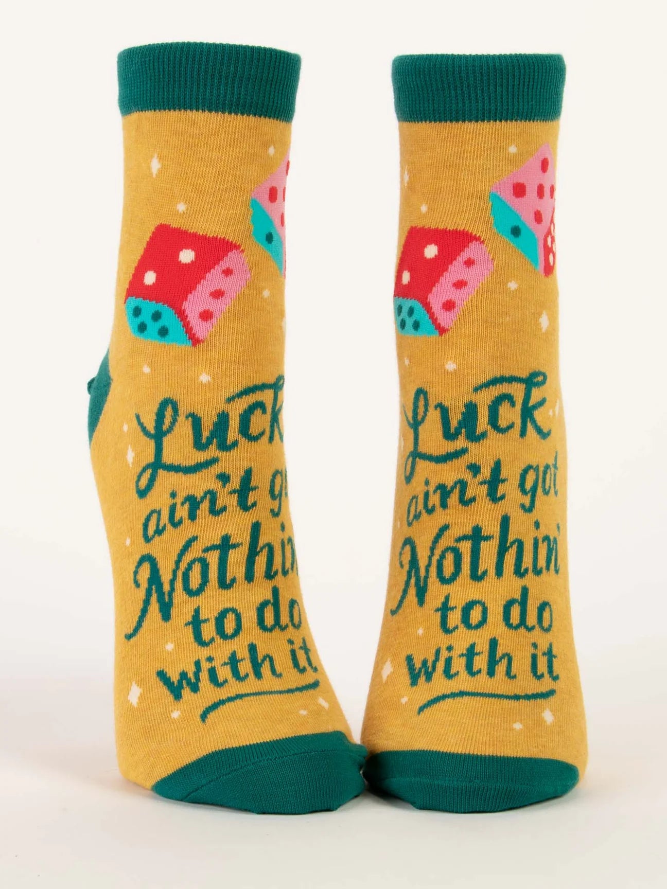 Yellow socks with dice and text on a white background