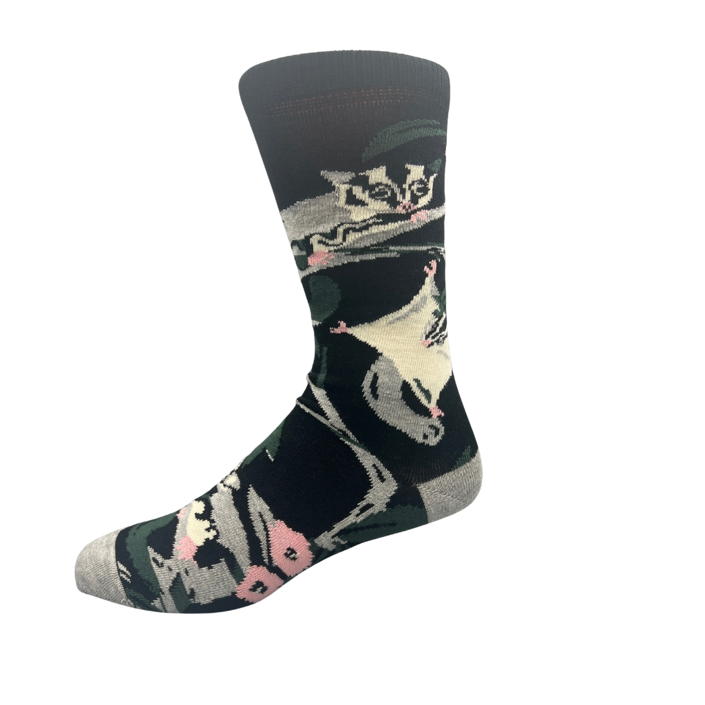 socks with possum and floral design on a black background