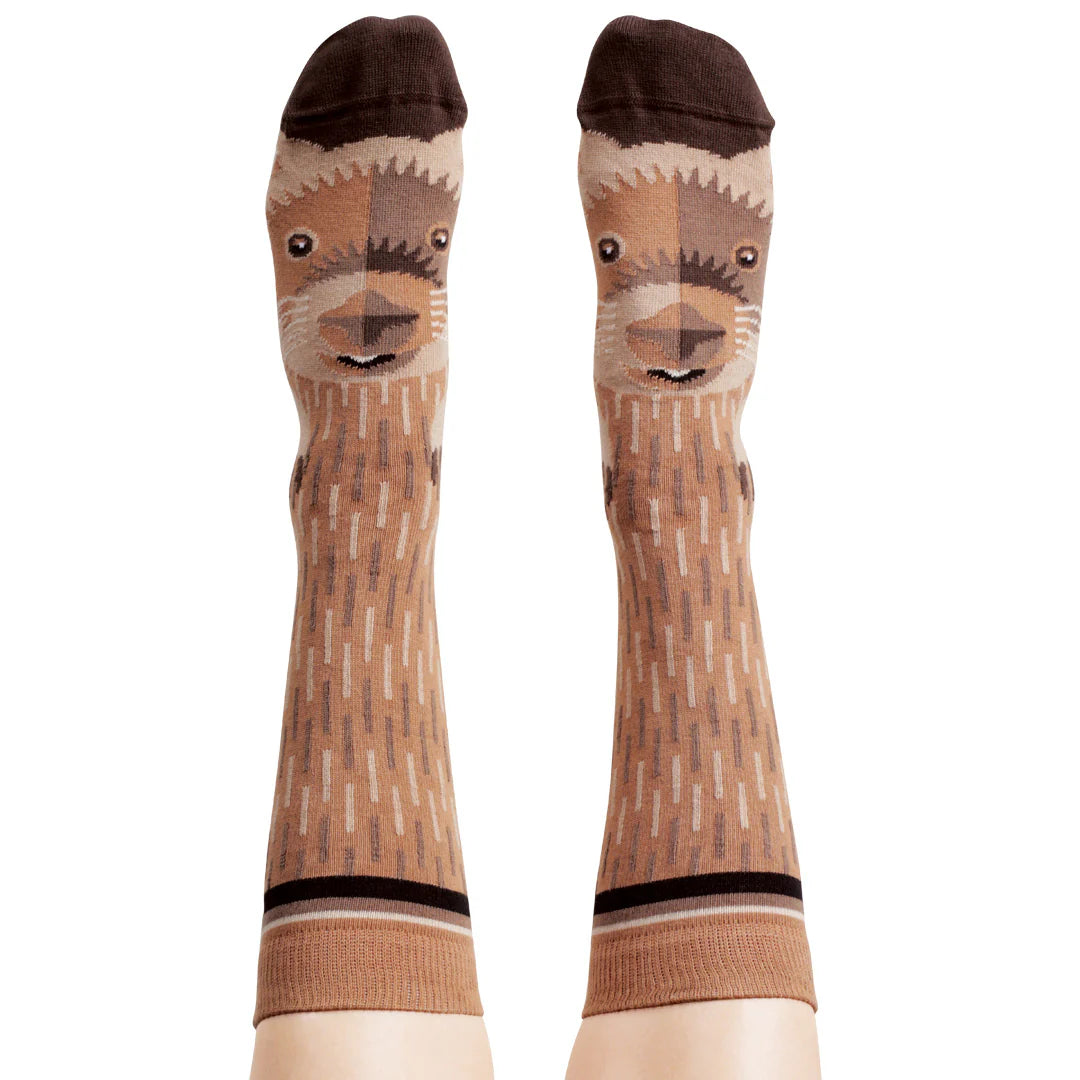Pair of socks with a wombat face design -The Sockery