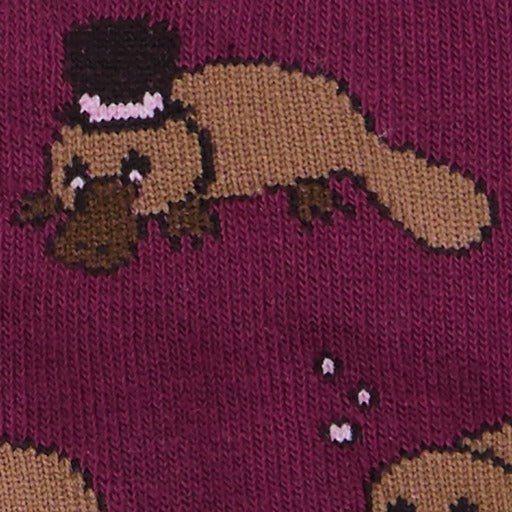 Detail of a platypus wearing a top hat, another one blowing bubbles -The Sockery