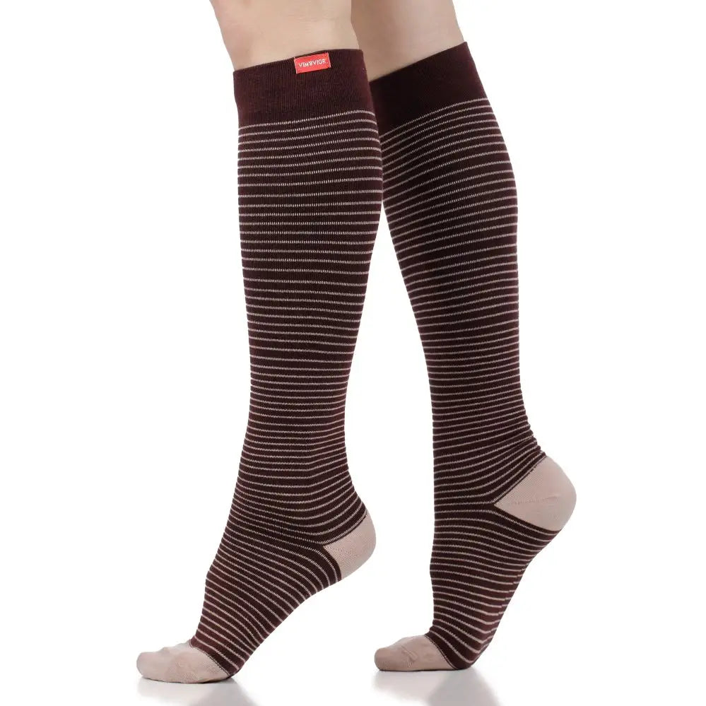 Brown striped knee-high compression socks on a white background