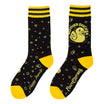 Black socks with yellow accents and duck patterns on a white background