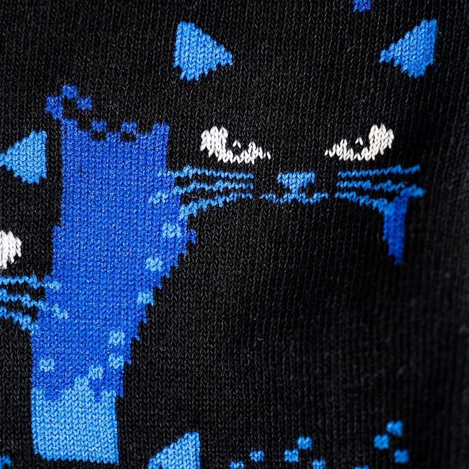 detail of cats in the dark kids knee high socks