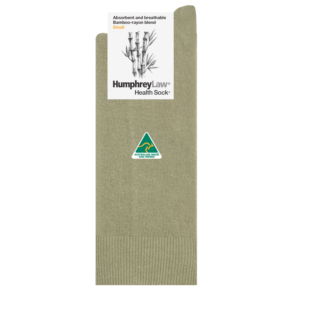 Green sock with Humphrey Law label on a white background