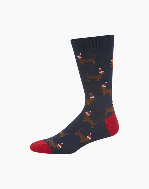 Navy sock with brown dog pattern and santa hats on a white background