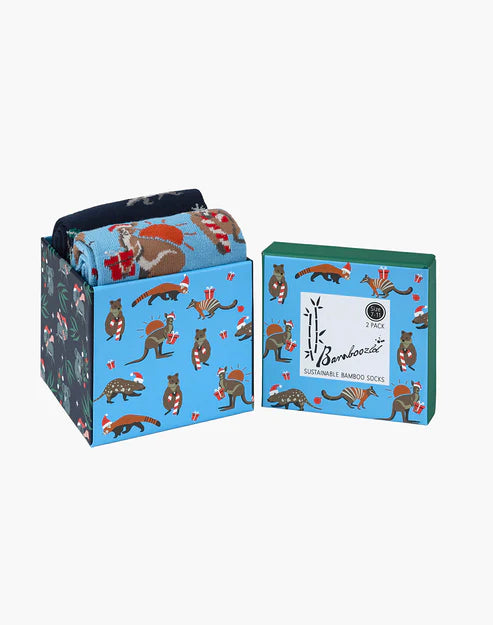 Box of bamboo socks with animal illustrations on a white background