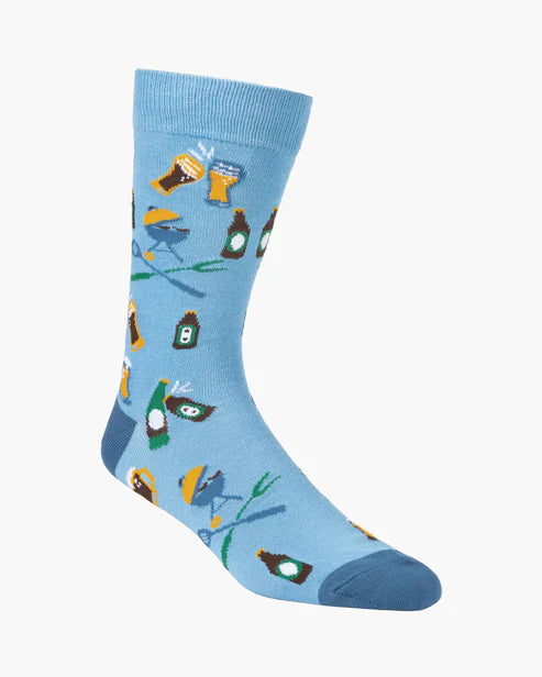 Blue sock with beer bottle and glass pattern on a white background