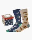 Two pairs of socks with animal patterns and a matching gift box on a white background