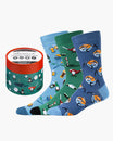 Three pairs of socks with different patterns and a container on a white background