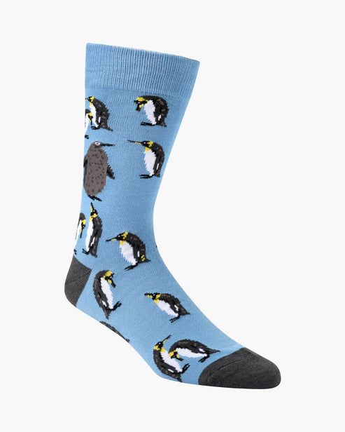 Blue sock with penguin pattern on a white background