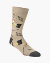 Beige sock with music themed designs on a white background