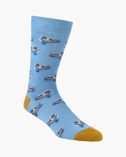 Blue sock with duck pattern on a white background