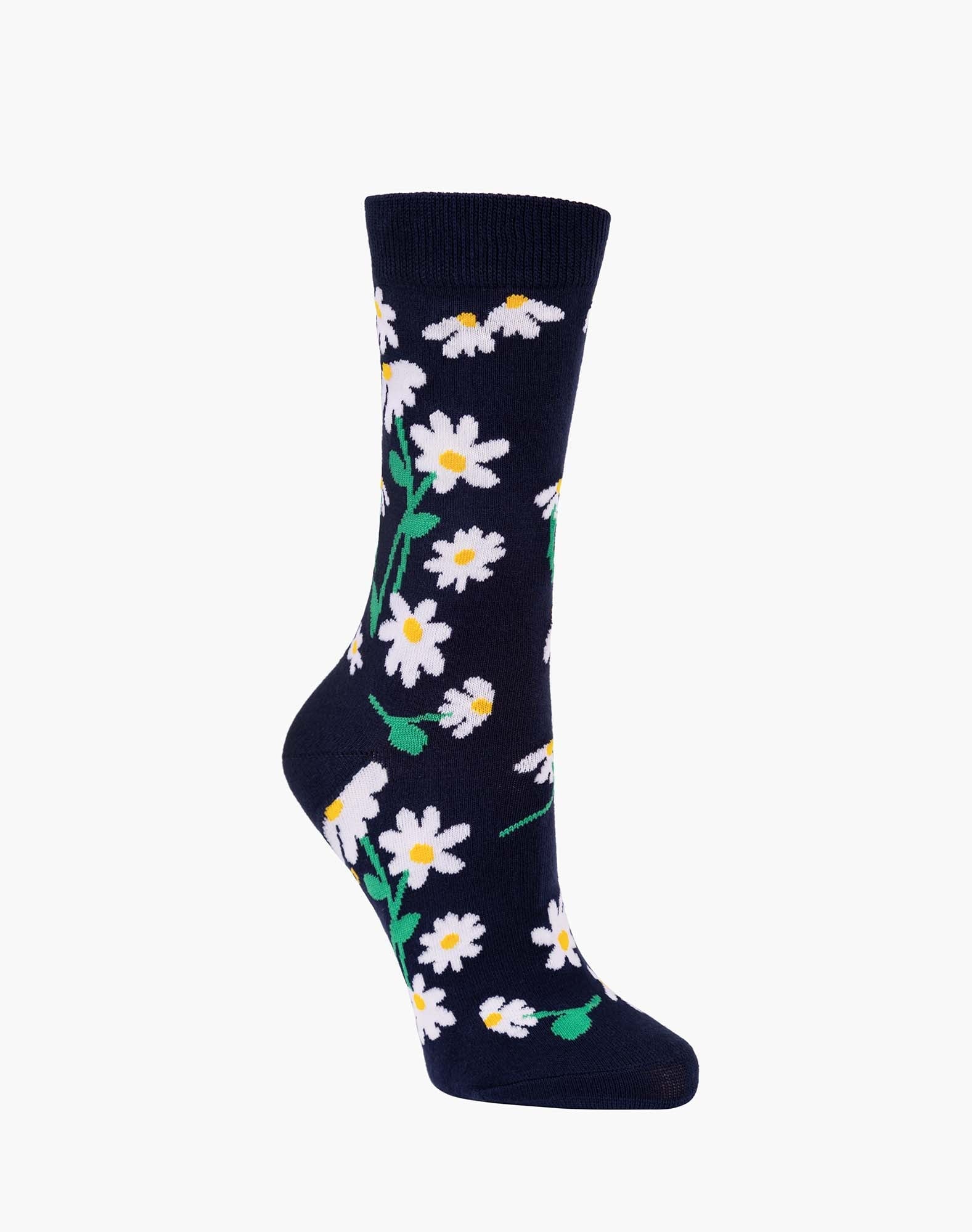 Navy blue sock with white daisy flower pattern on a white background