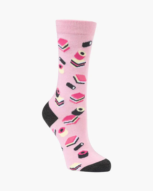 Pink socks with black and multicolor designs on a white background