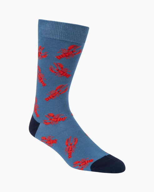 Blue sock with red lobster pattern on a white background