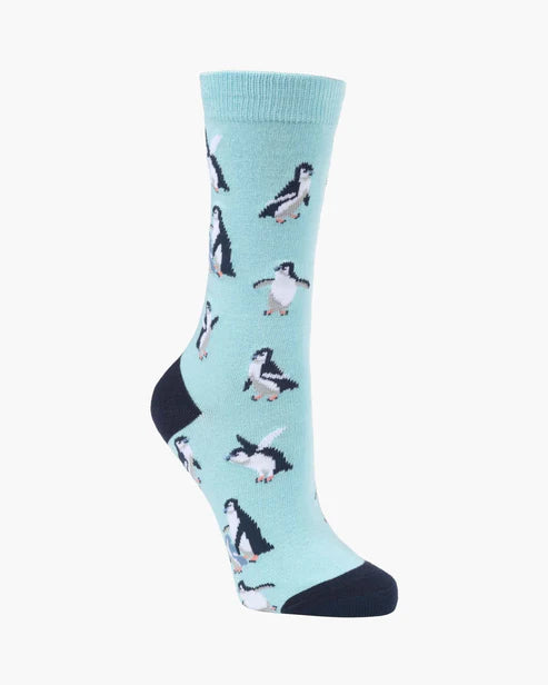 Light blue socks with penguin pattern on a white background