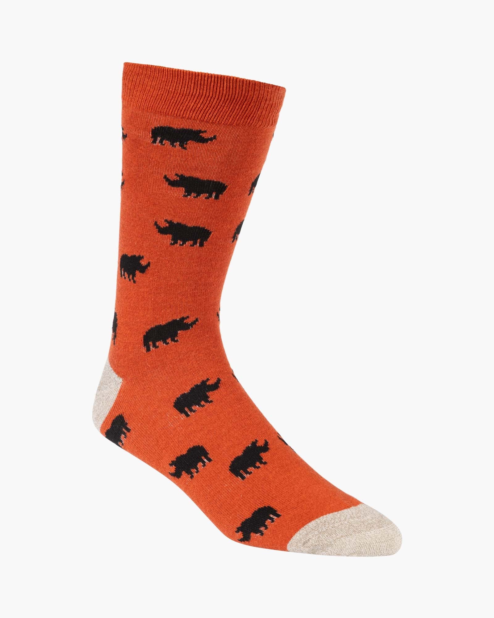 Orange sock with black rhino pattern on a white background