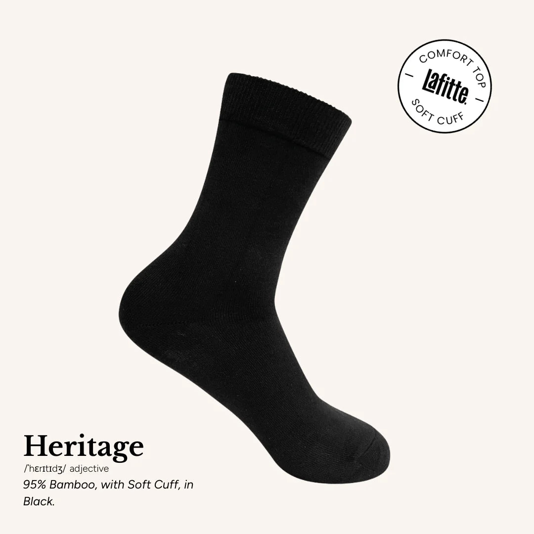 Black sock on a white background with 'Heritage' branding.
