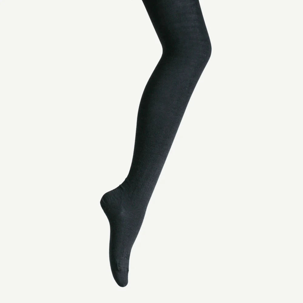 Charcoal tights worn by a person on a white background
