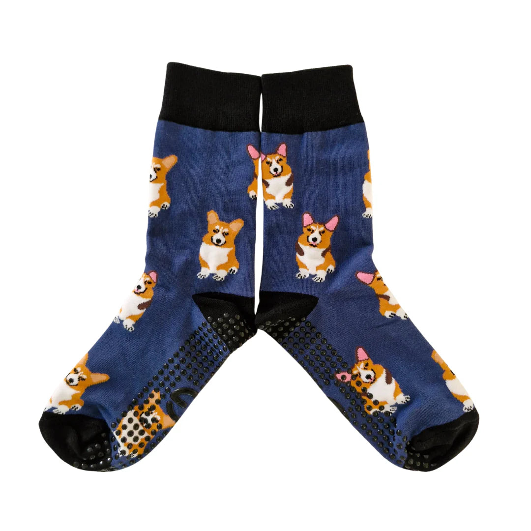 Blue socks with corgi dog pattern on a white background