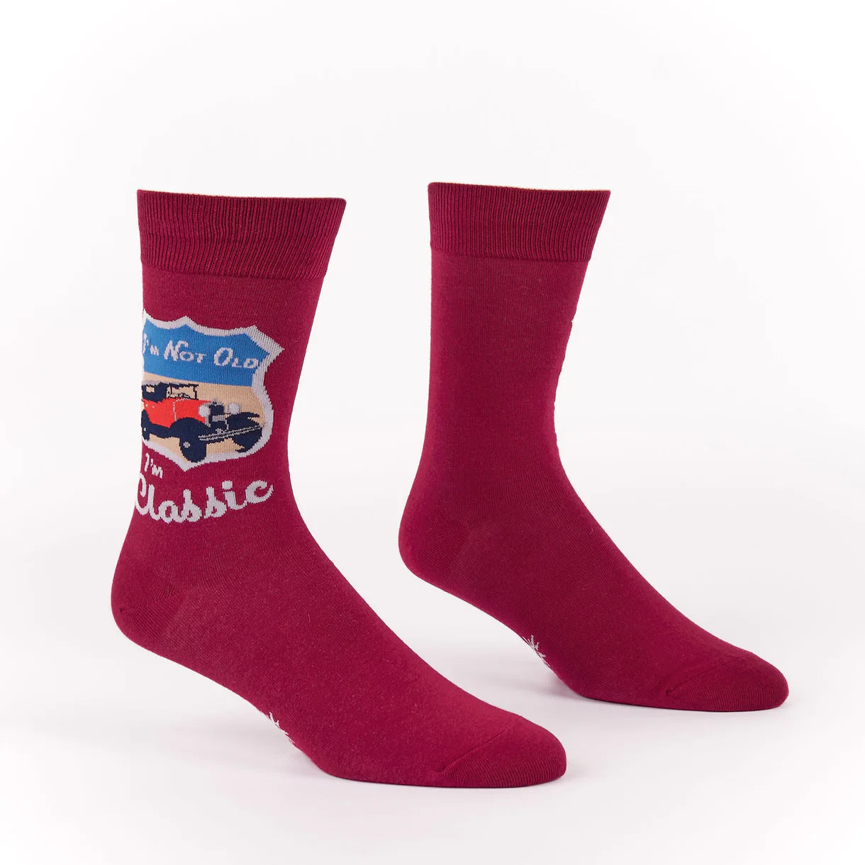 Red socks with a graphic design on a white background