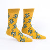 Yellow socks with alligator pattern on a white background