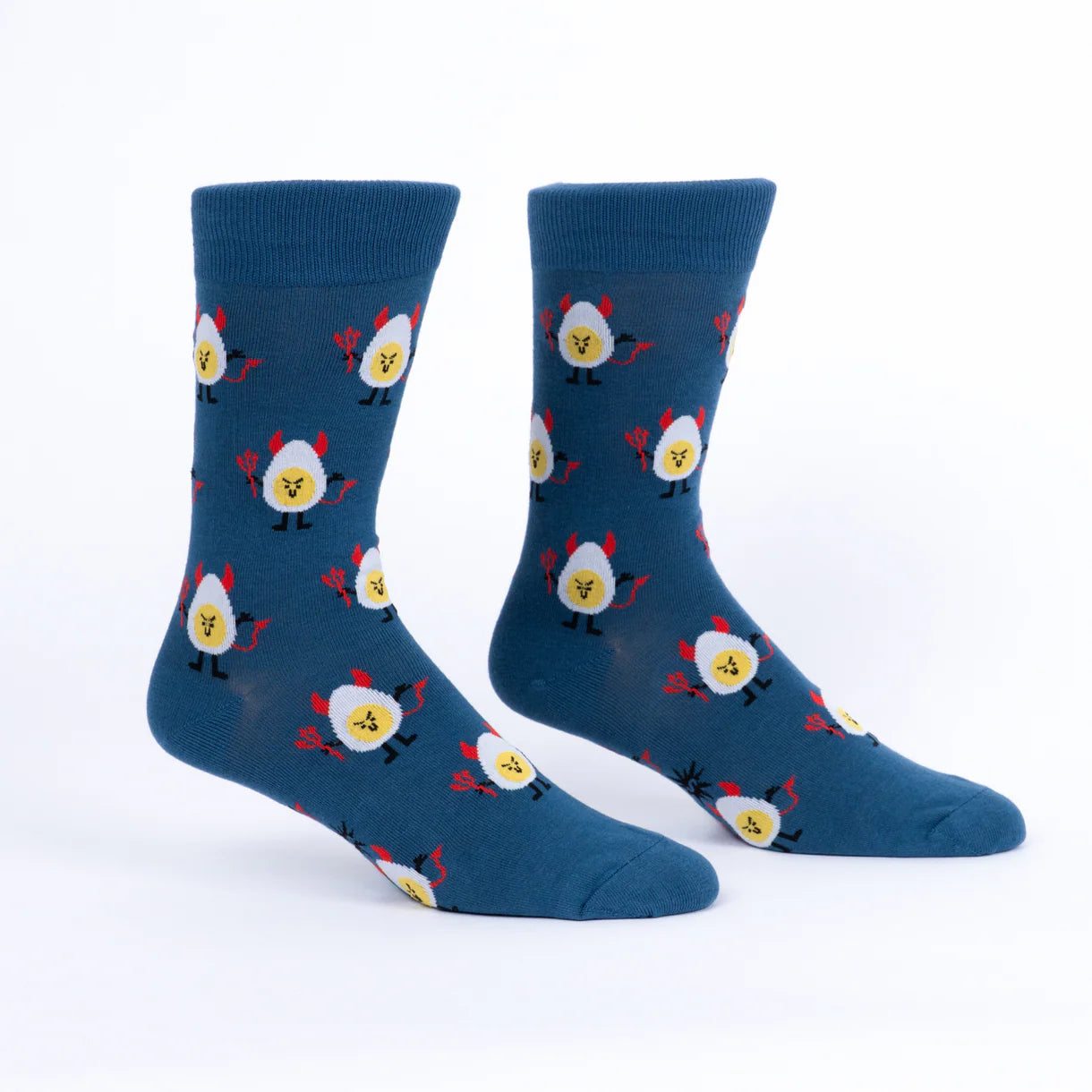 Blue socks with cartoon egg design on a white background
