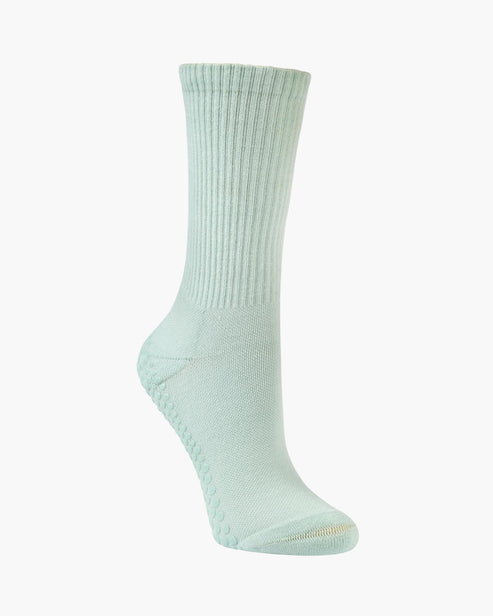 A single ribbed crew sock in a pale mint green color, shown from a side profile against a plain white background.