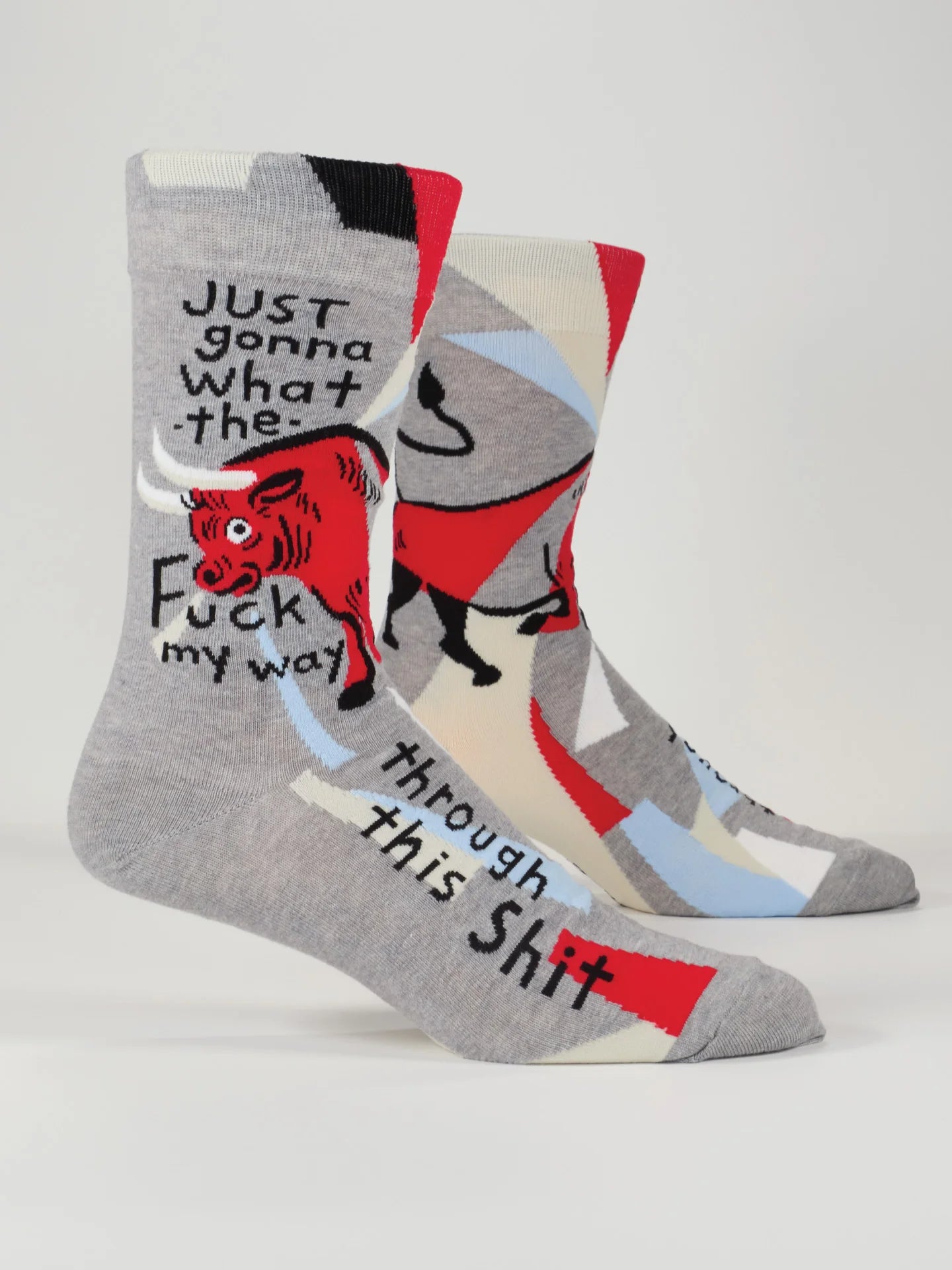 Gray socks with a graphic of a bull and text on a white background