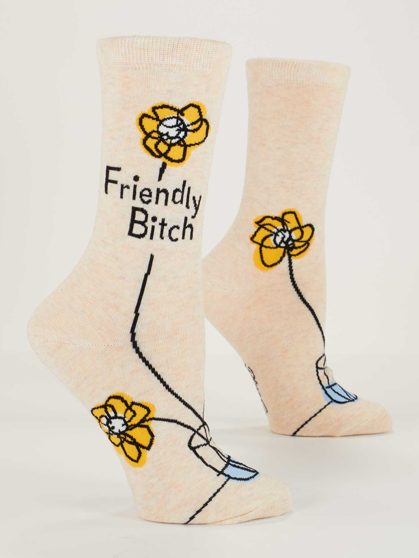 Beige socks with yellow flowers and text on a white background