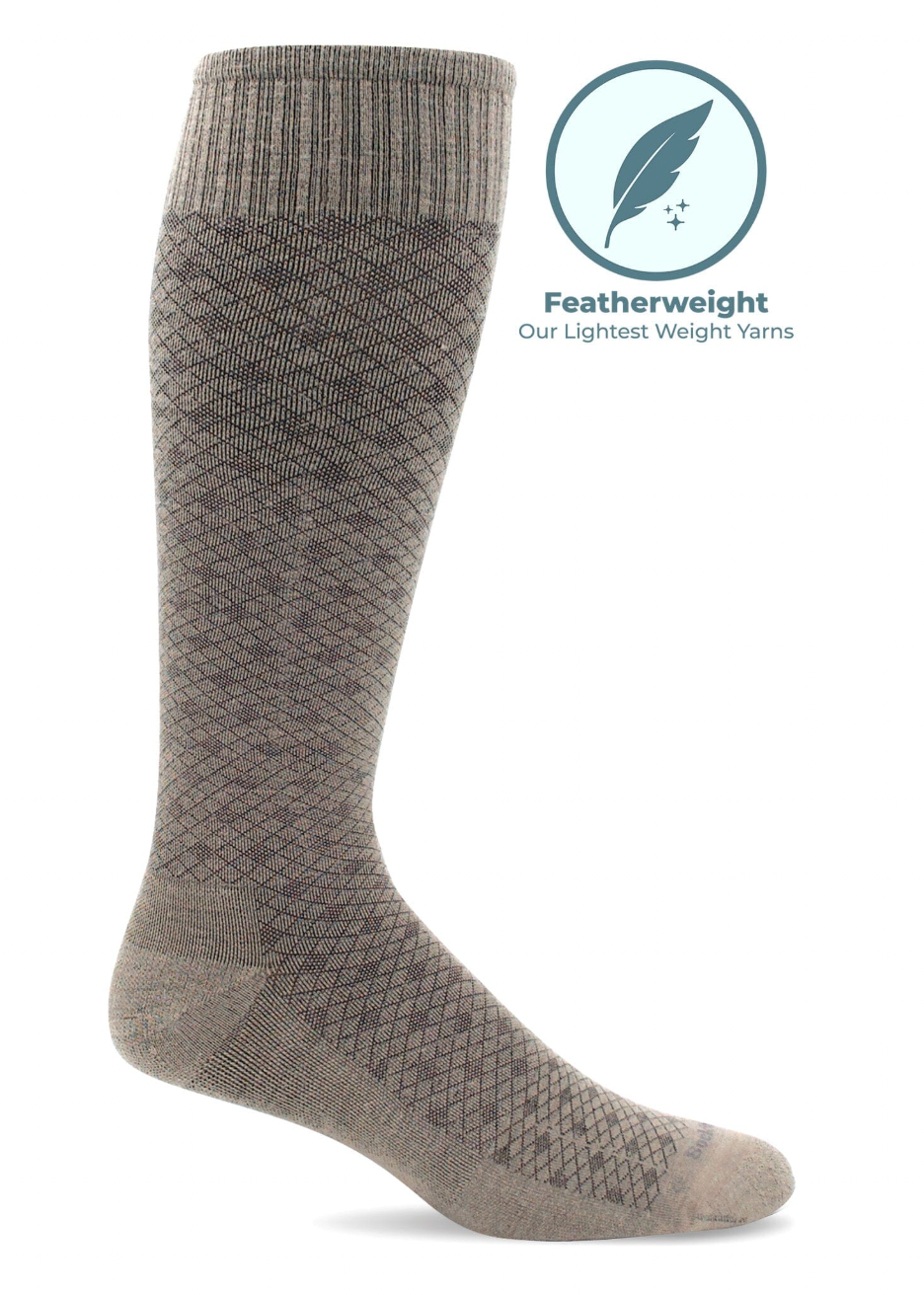 Gray knee-high sock with a textured pattern on a white background, featuring a featherweight label.
