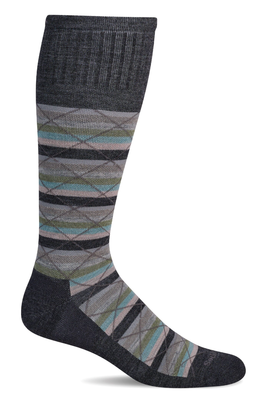 Knee-high sock with geometric pattern on a white background