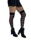tartan knee-high socks worn with black boots on a white background