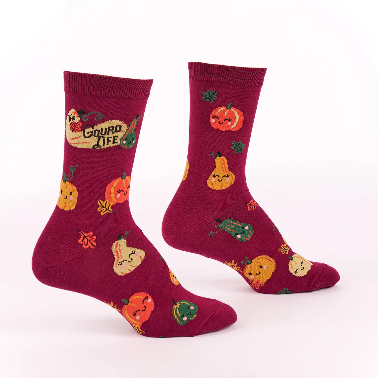 Maroon socks with pumpkin and gourd designs on a white background