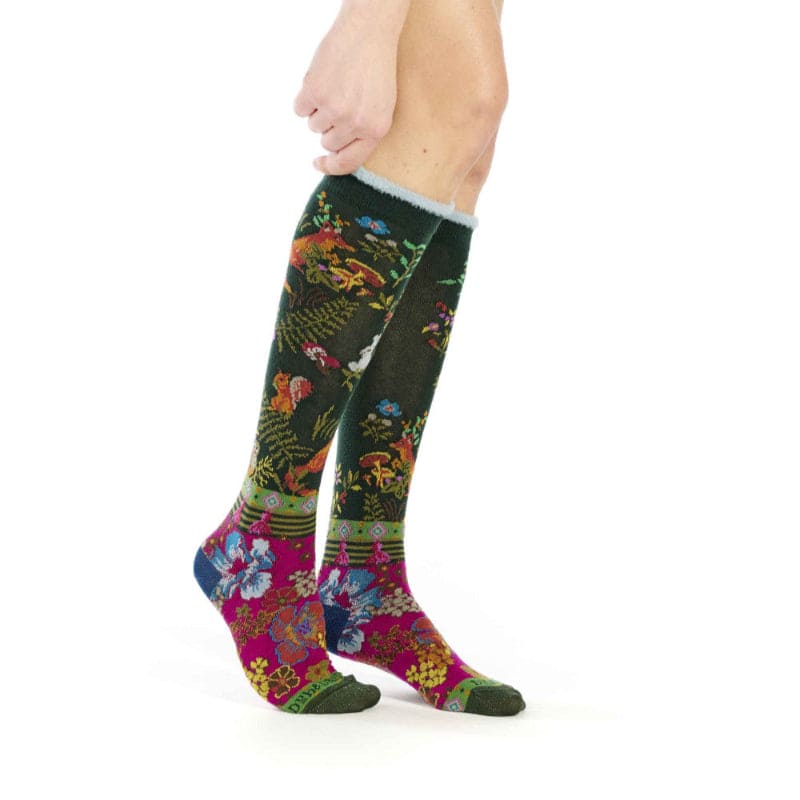 Colorful floral knee-high socks on a white background